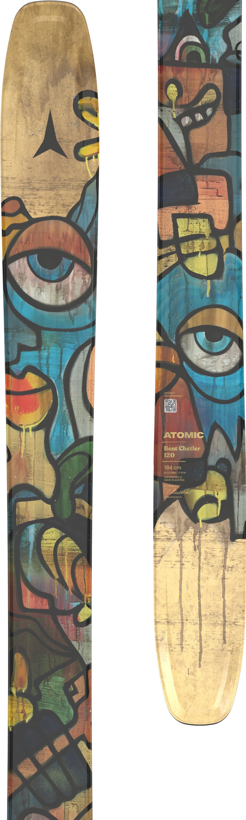 Colorful artistic design on a wooden surface with abstract patterns and eye-like shapes.