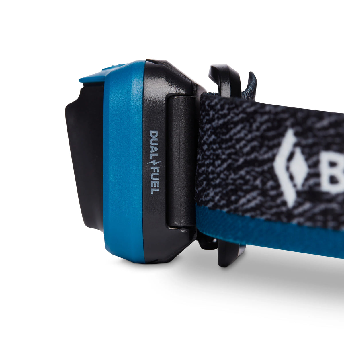 Close-up of a blue and black headlamp with a brand logo on a white background