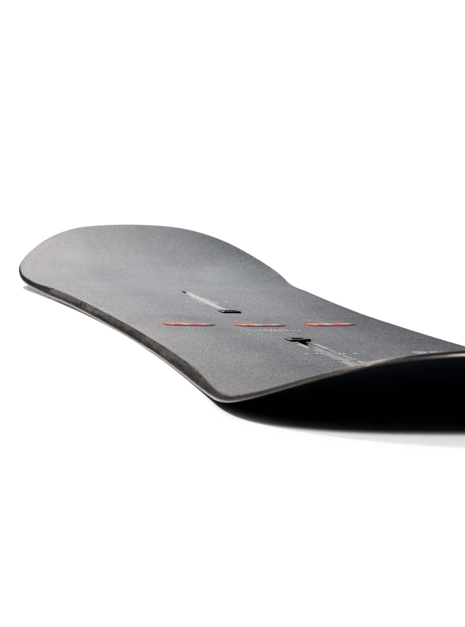 Black snowboard on a white background