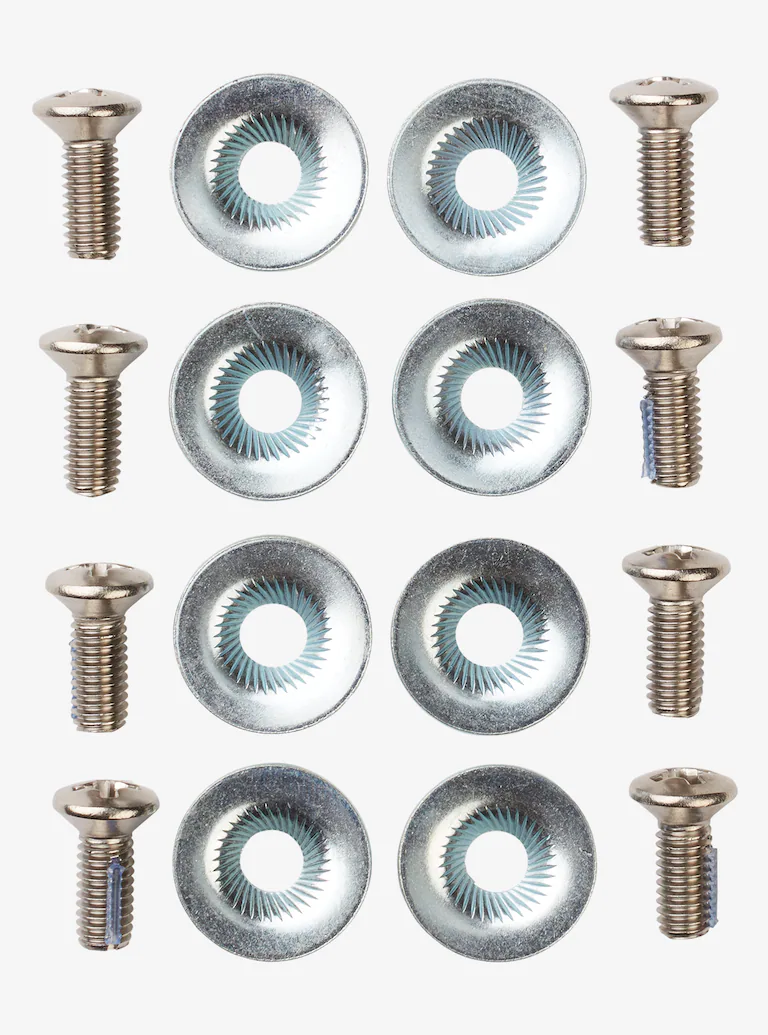 Set of screws with circular heads on a white background