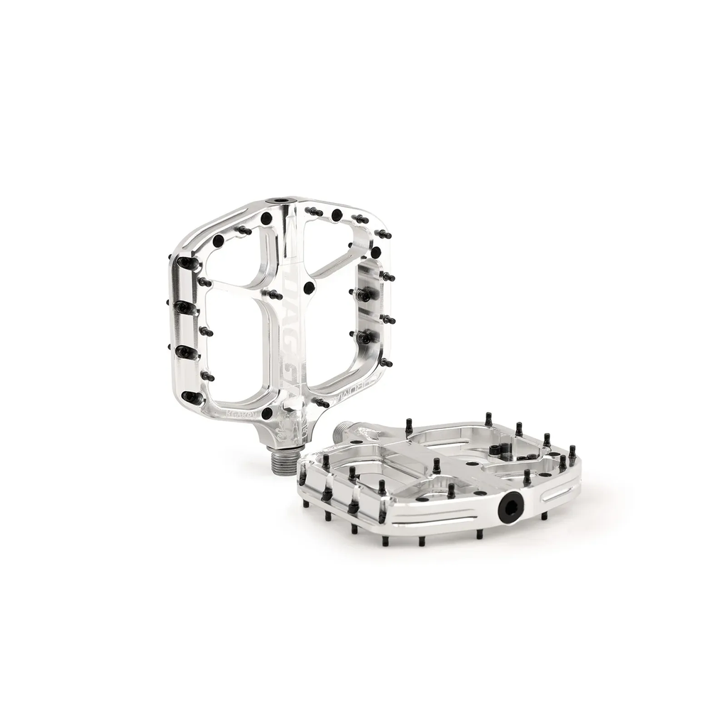 Metallic bicycle pedal on a white background