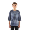 Child wearing a blue tie-dye shirt with a logo on a white background