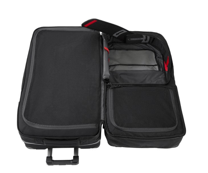 Black suitcase with a smaller black bag inside on a white background