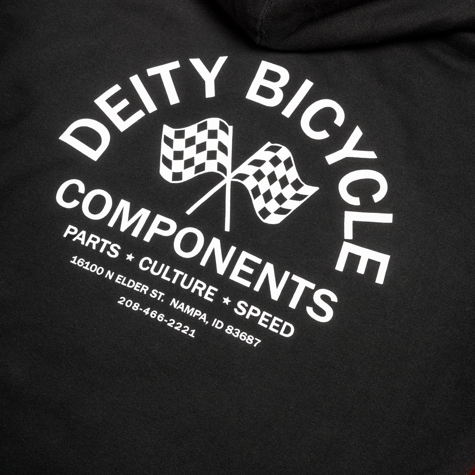 Black hoodie with 'Deity Bicycle Components' logo on a red background