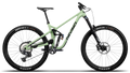 Light green mountain bike with black components on a white background