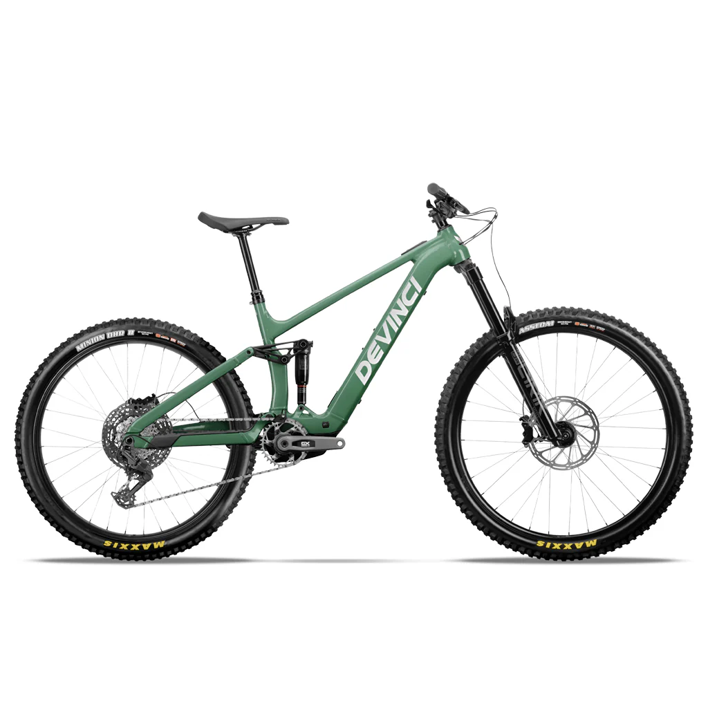 Green Devinci bicycle on a white background