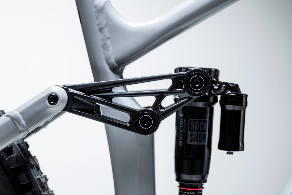 Close-up of a bicycle suspension fork with a white background