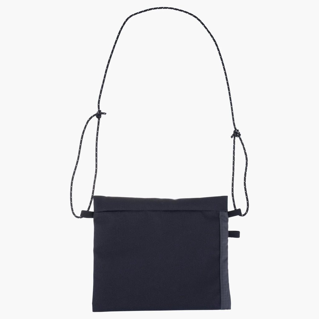 Black drawstring bag on a white background