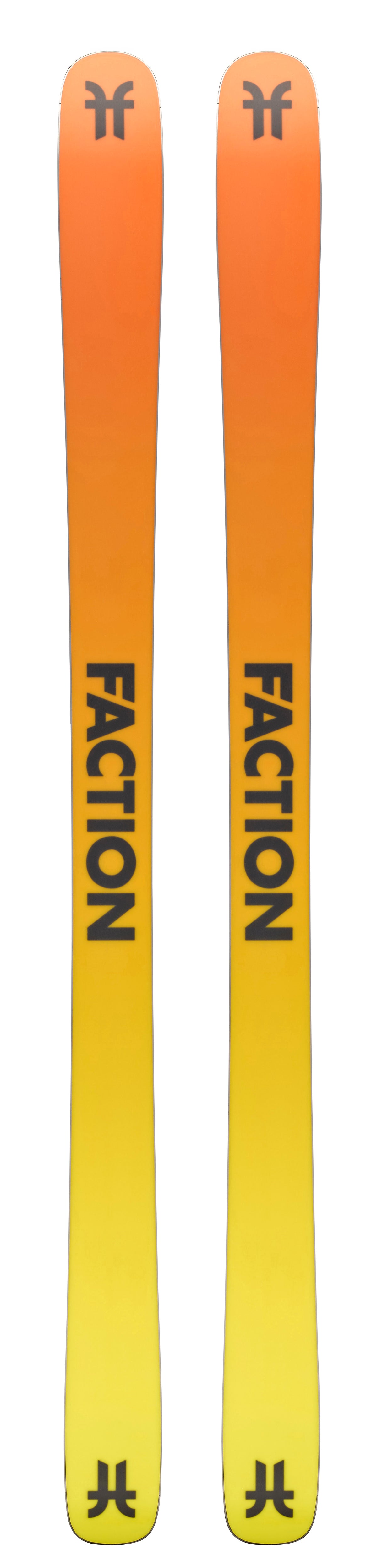 Two Faction skis with orange and yellow design on a white background
