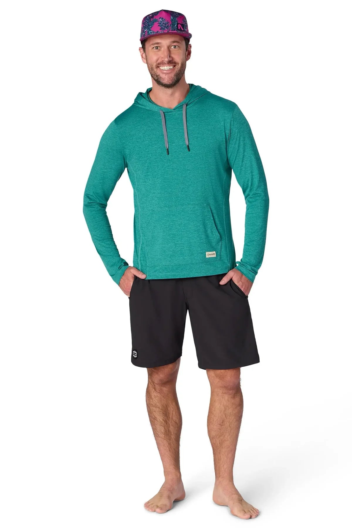 Man wearing a teal hoodie and black shorts on a white background