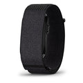 A black textured fabric smartwatch band shown from a side angle on a clean white background.