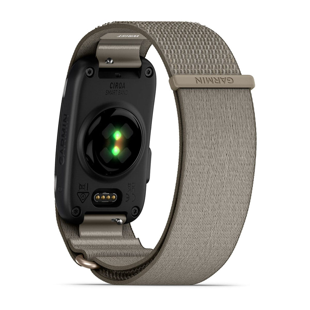 Garmin smartwatch with a black circular heart rate sensor and a textured taupe-gray fabric loop band, shown on a clean white background.