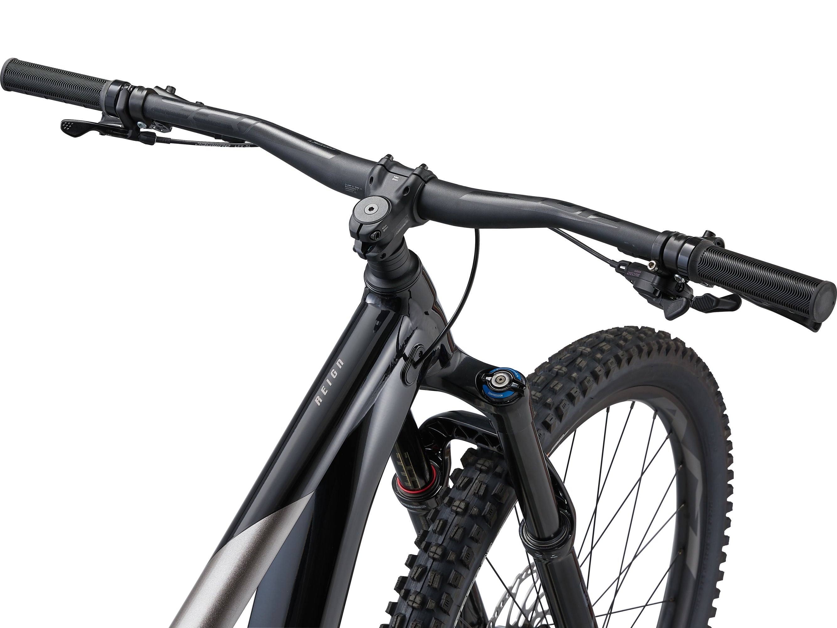 Close-up of a bicycle handlebar and front wheel on a white background