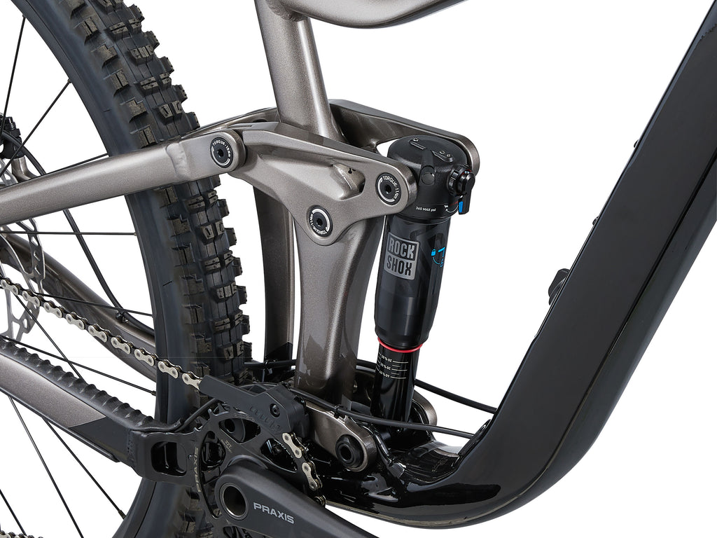 Close-up of a bicycle suspension fork with 'Rock Shox' branding on a white background