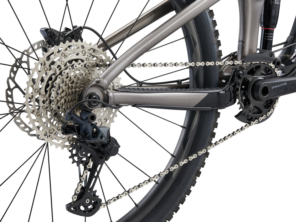 Close-up of a bicycle's gear system on a white background
