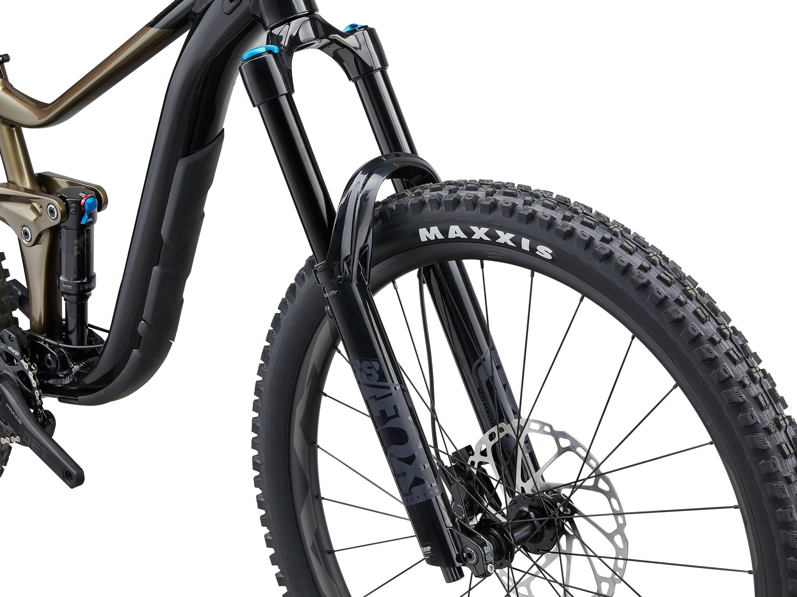 Close-up of a bicycle wheel with Maxxis tire on a white background
