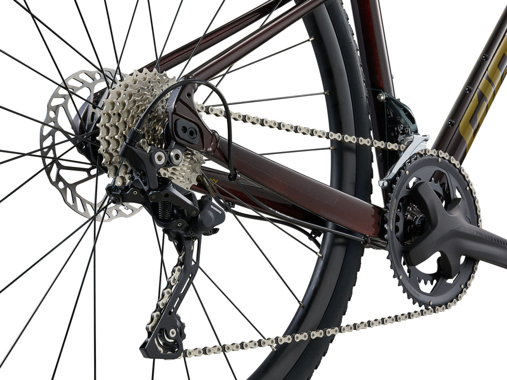 Close-up of a bicycle's gear system on a white background