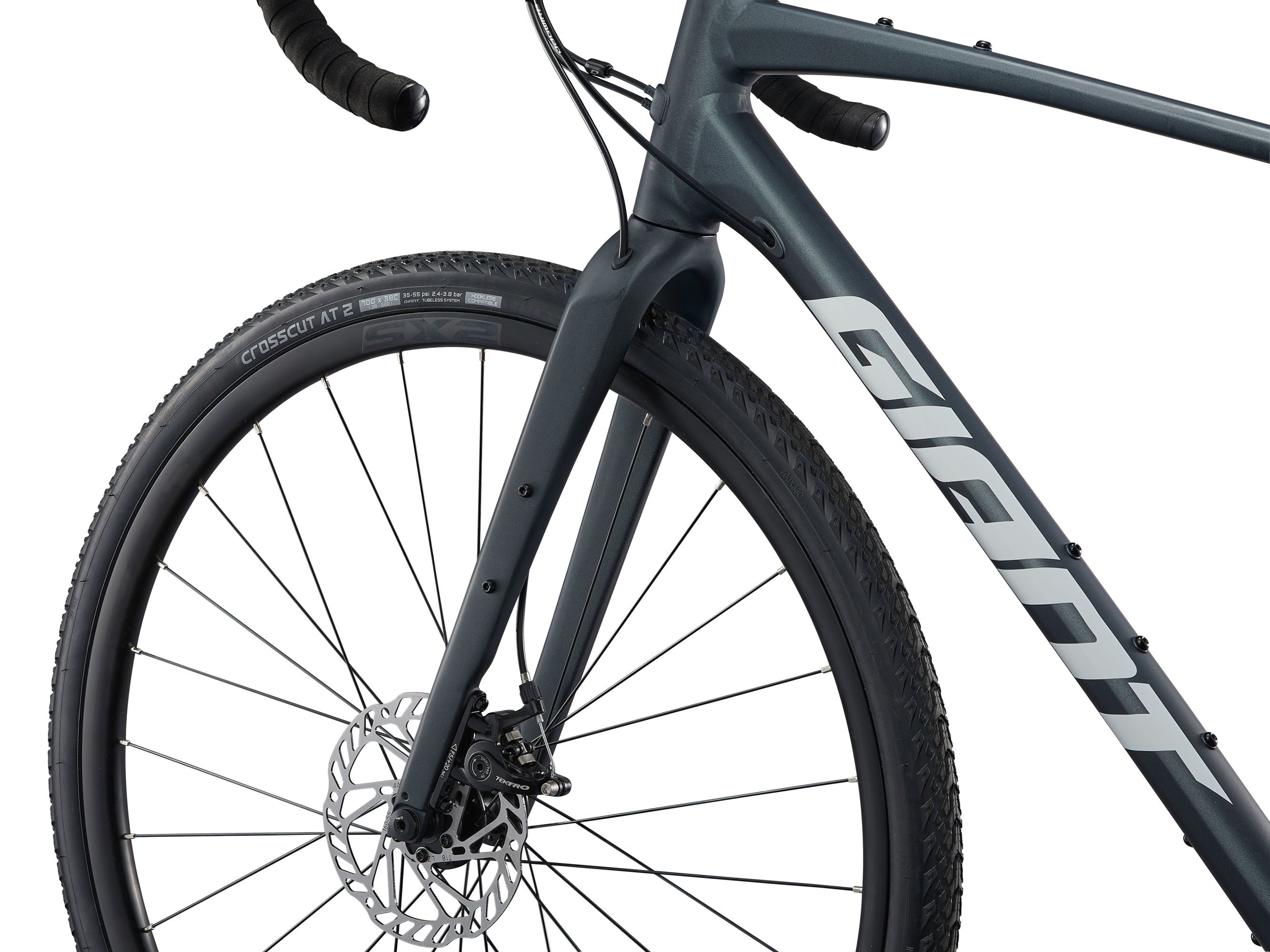 Close-up of a bicycle with 'Giant' branding on a white background