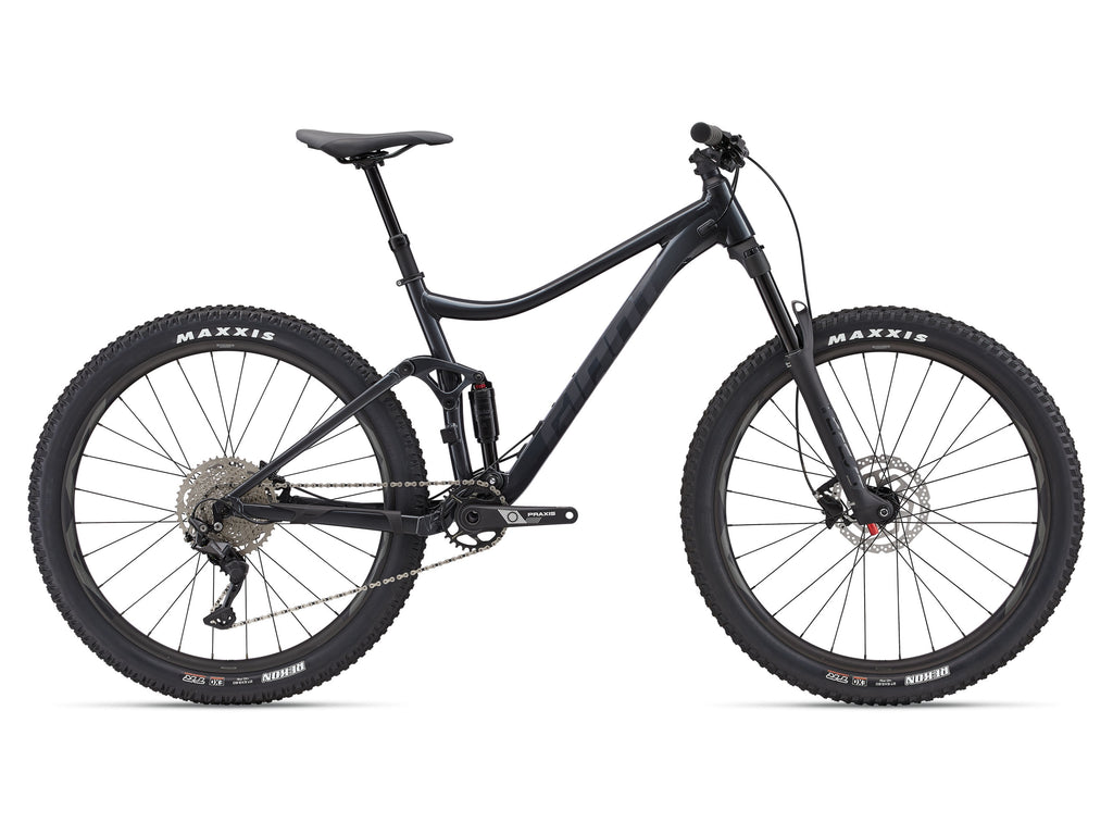 Black mountain bike with Maxxis tires on a white background