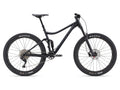 Black mountain bike with Maxxis tires on a white background