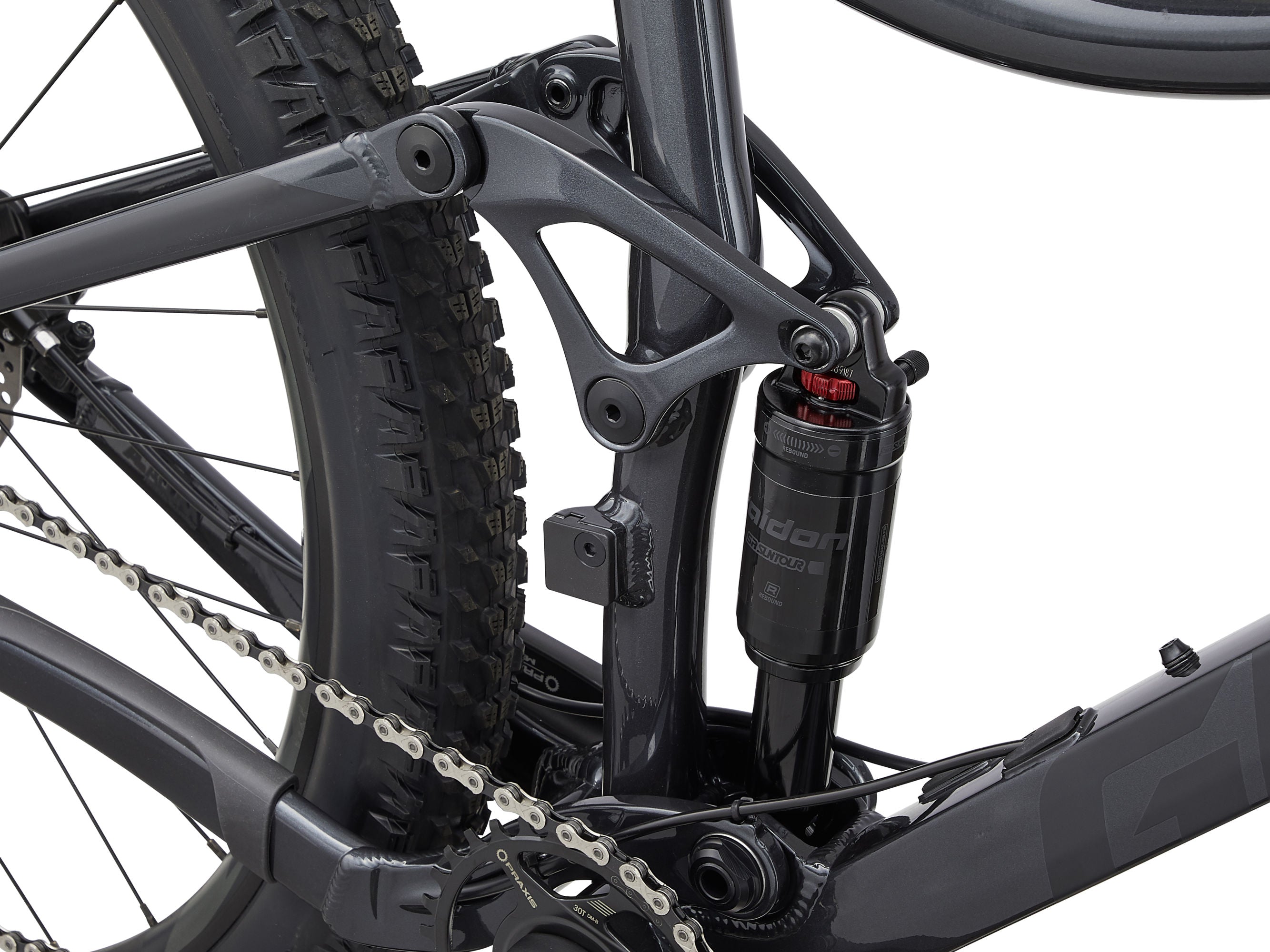 Close-up of a bicycle suspension fork and chain on a white background