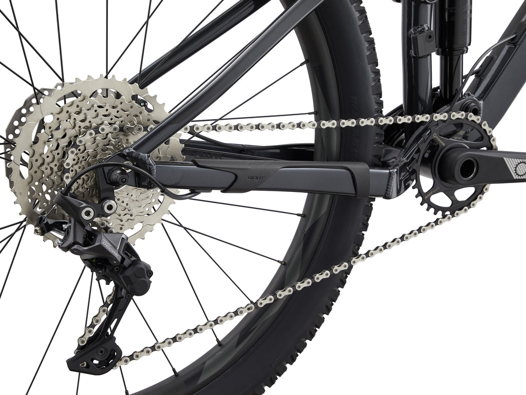 Close-up of a bicycle's gear system on a white background