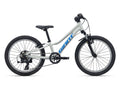 White children's bicycle with black tires and blue Giant logo on a white background