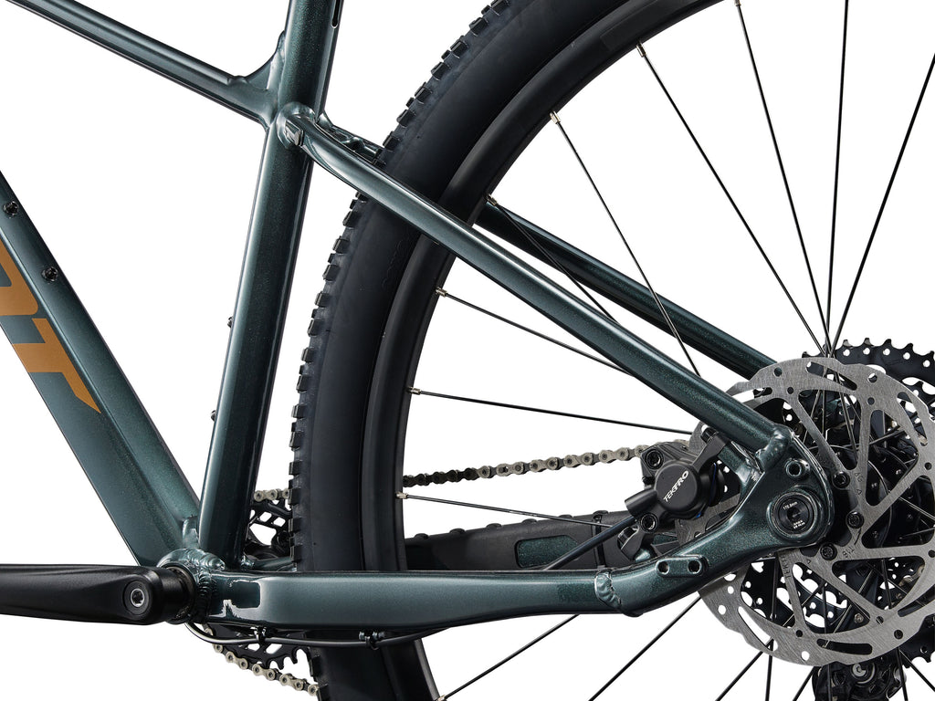 Close-up of a bicycle's chain mechanism on a white background