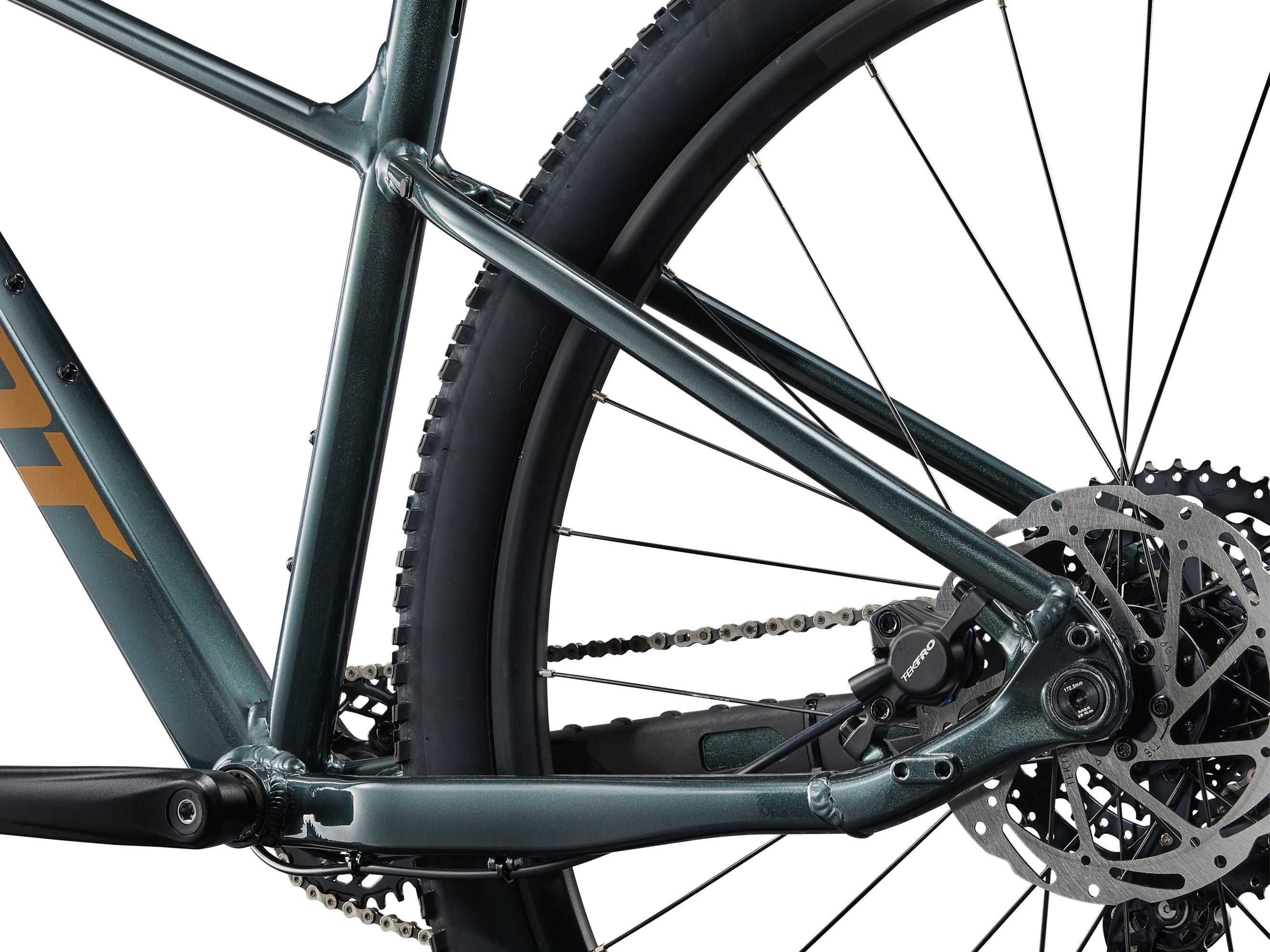 Close-up of a bicycle's chain mechanism on a white background