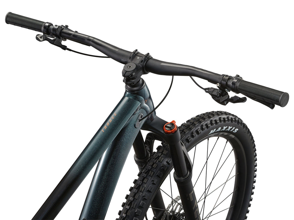 Close-up of a bicycle handlebar and front wheel on a white background
