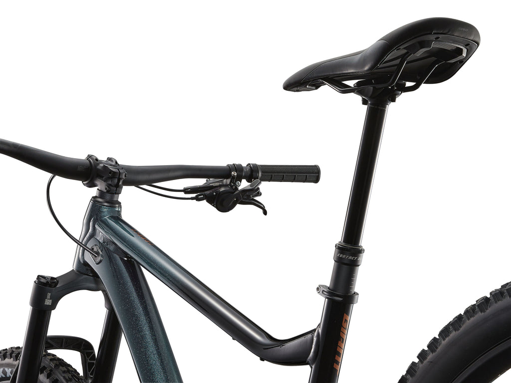 Close-up of a bicycle with a black seat and handlebars on a white background