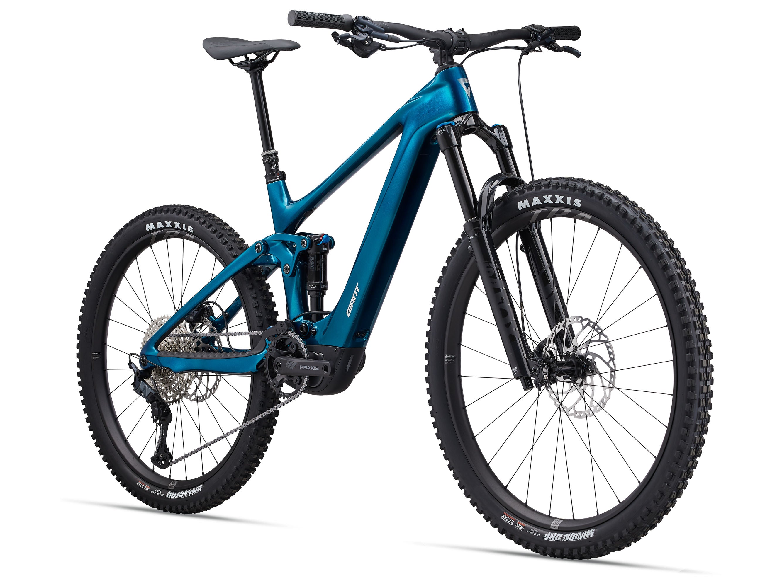 Blue mountain bike with Maxxis tires on a white background