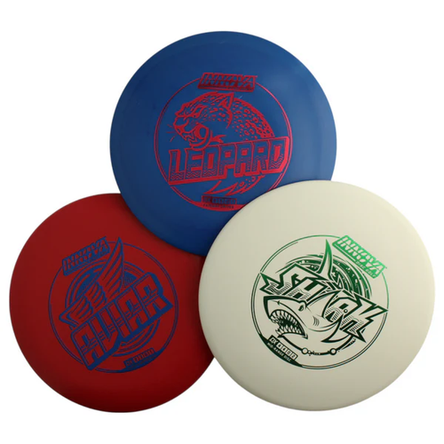 Three disc golf discs with different designs and colors on a white background