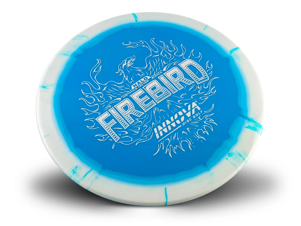 A disc golf disc featuring a vibrant blue center with white flame graphics and the text 'FIREBIRD' and 'INNOVA BRAND', surrounded by a white outer rim with blue edge accents, shown on a white background with a soft shadow.