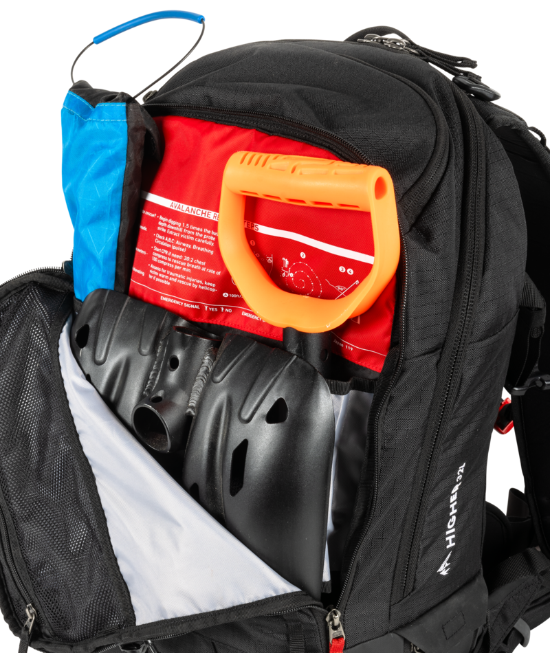 Black backpack with a helmet and airbag inside.