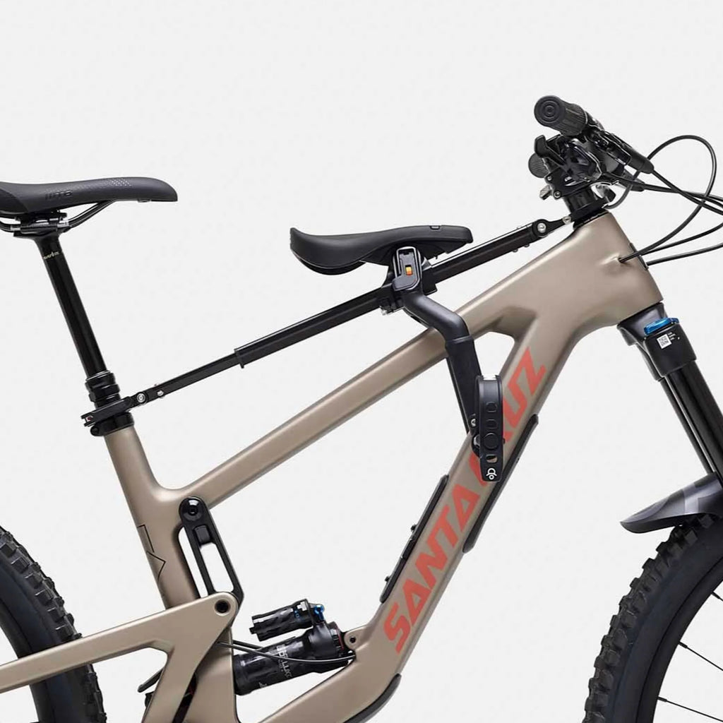 Beige bicycle with black components on a white background
