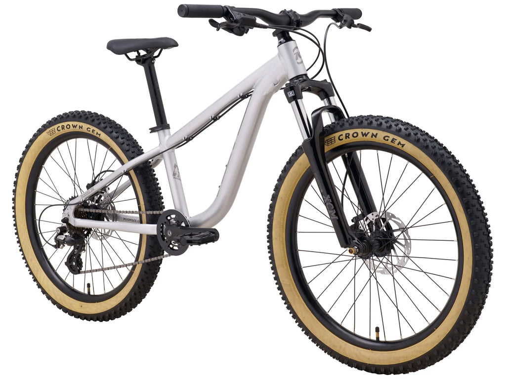 White mountain bike with black components on a white background