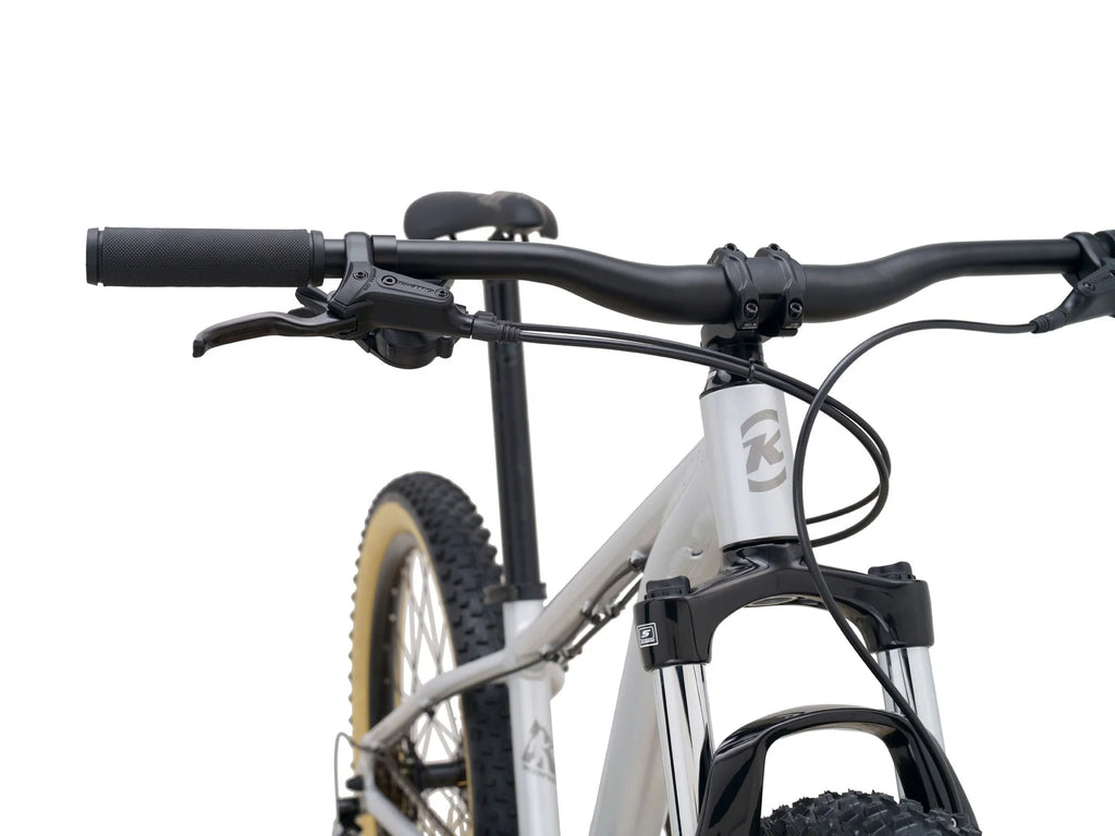 Close-up of a bicycle handlebar with a white background