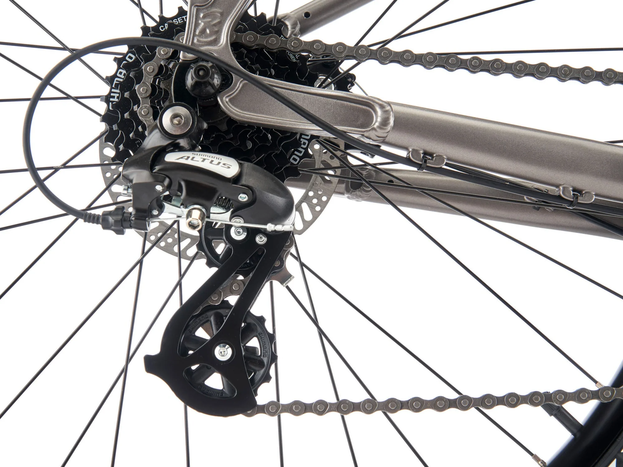 Close-up of a bicycle's gear system on a white background