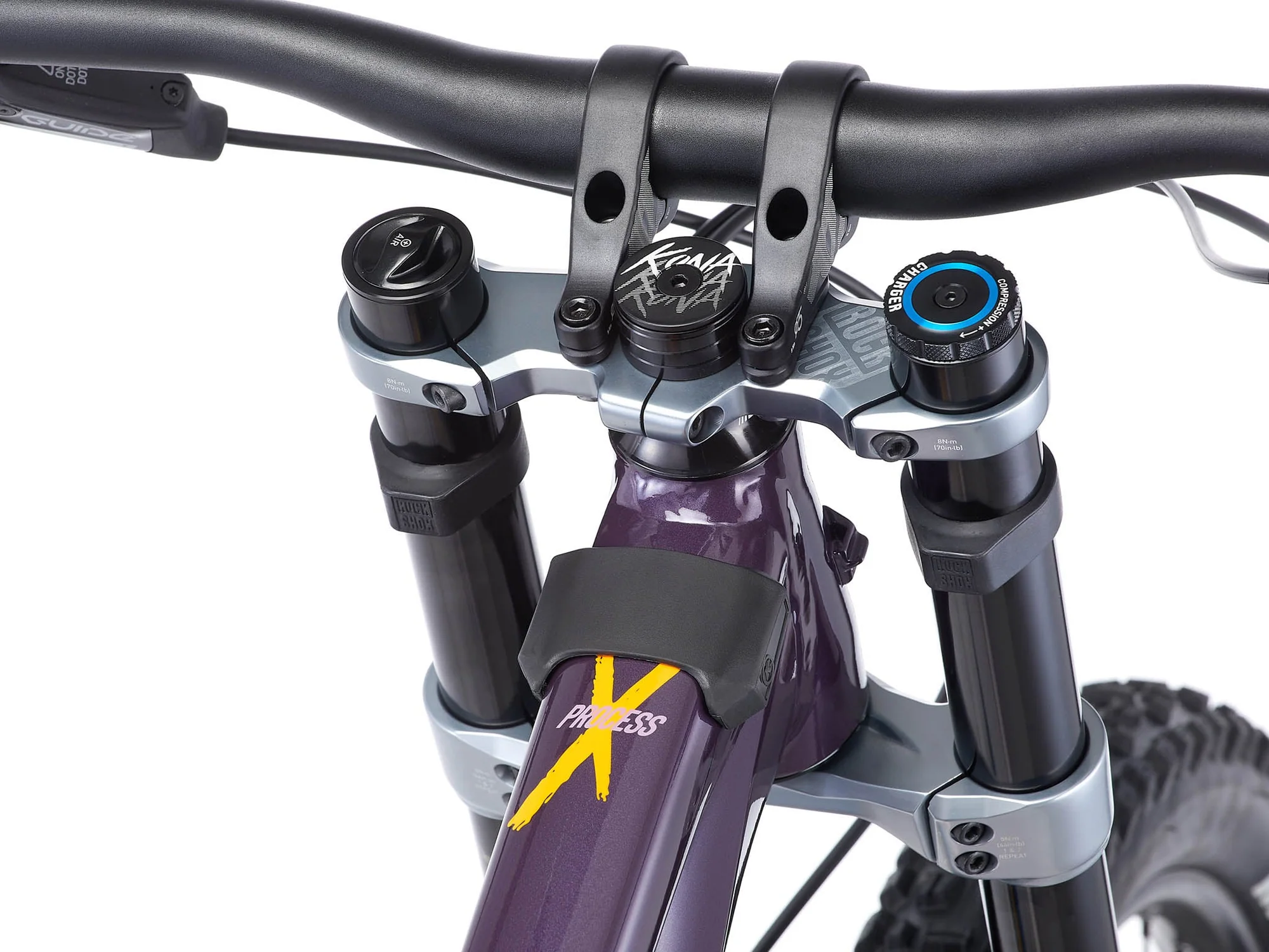 Close-up of a bicycle handlebar with purple frame and brand logo on a white background