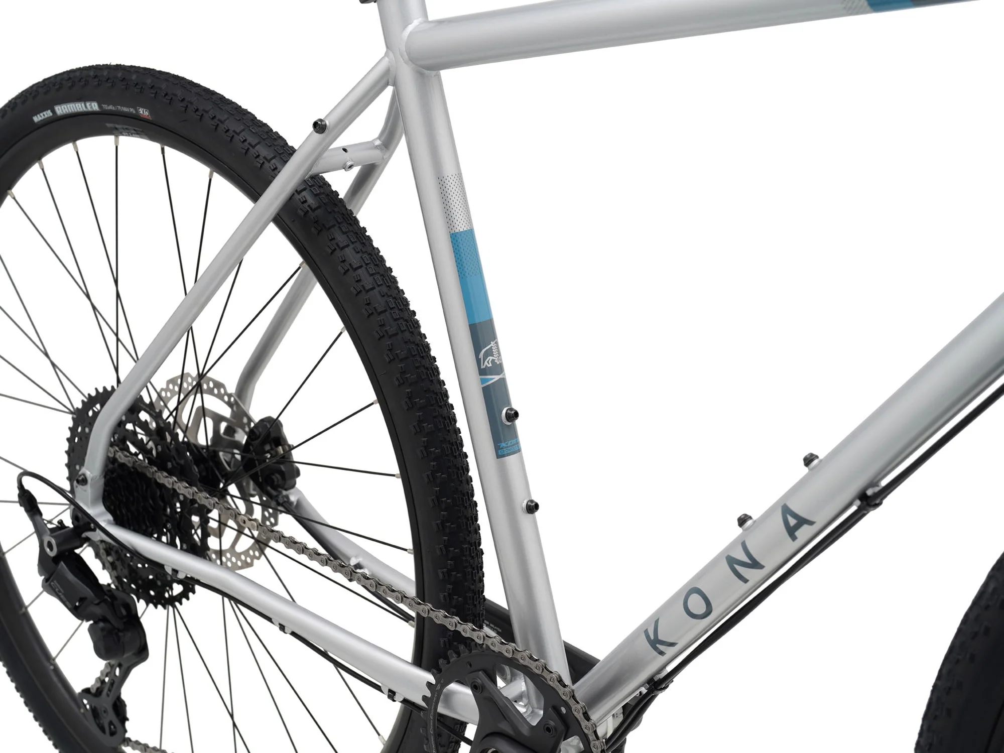 Close-up of a bicycle with 'Kona' branding on a white background