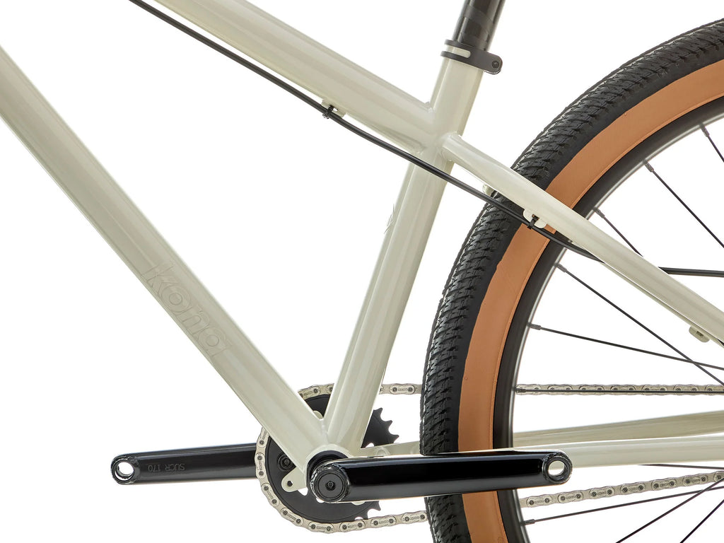 Close-up of a bicycle chain and gear system on a white background