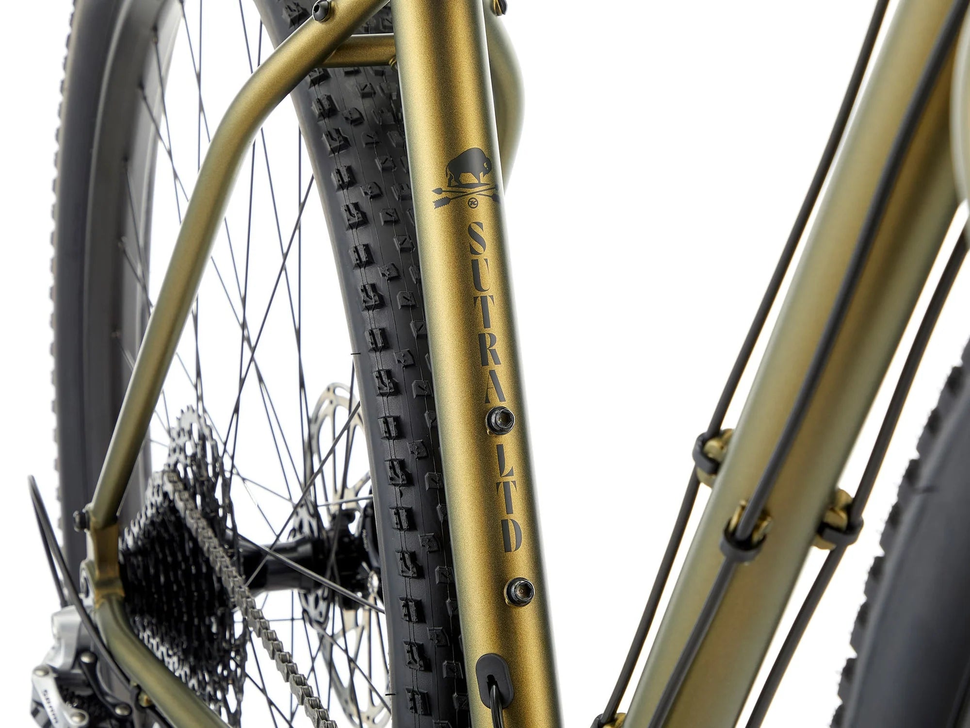 Close-up of a bicycle tire with 'Sutra' branding on a white background