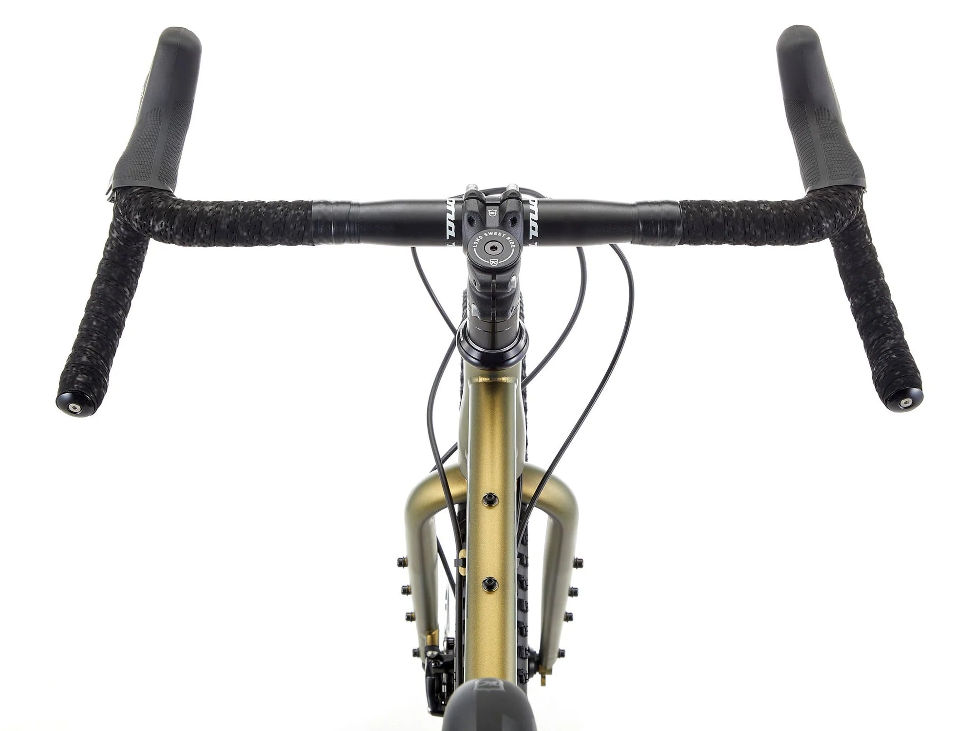 Front view of a gravel bicycle with a matte gold frame, black drop handlebars wrapped in black tape, and a black headset on a white background.