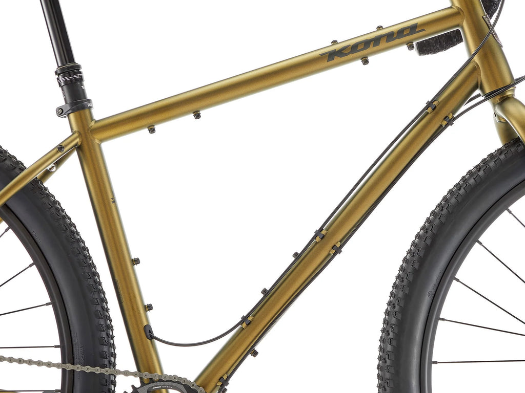 Gold bicycle frame with 'Kona' branding on a white background