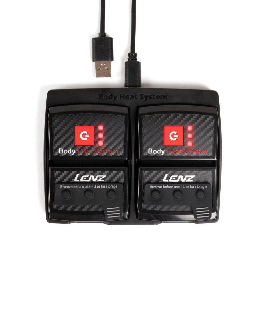 Lenz body heat system with two controllers and a USB cable on a white background