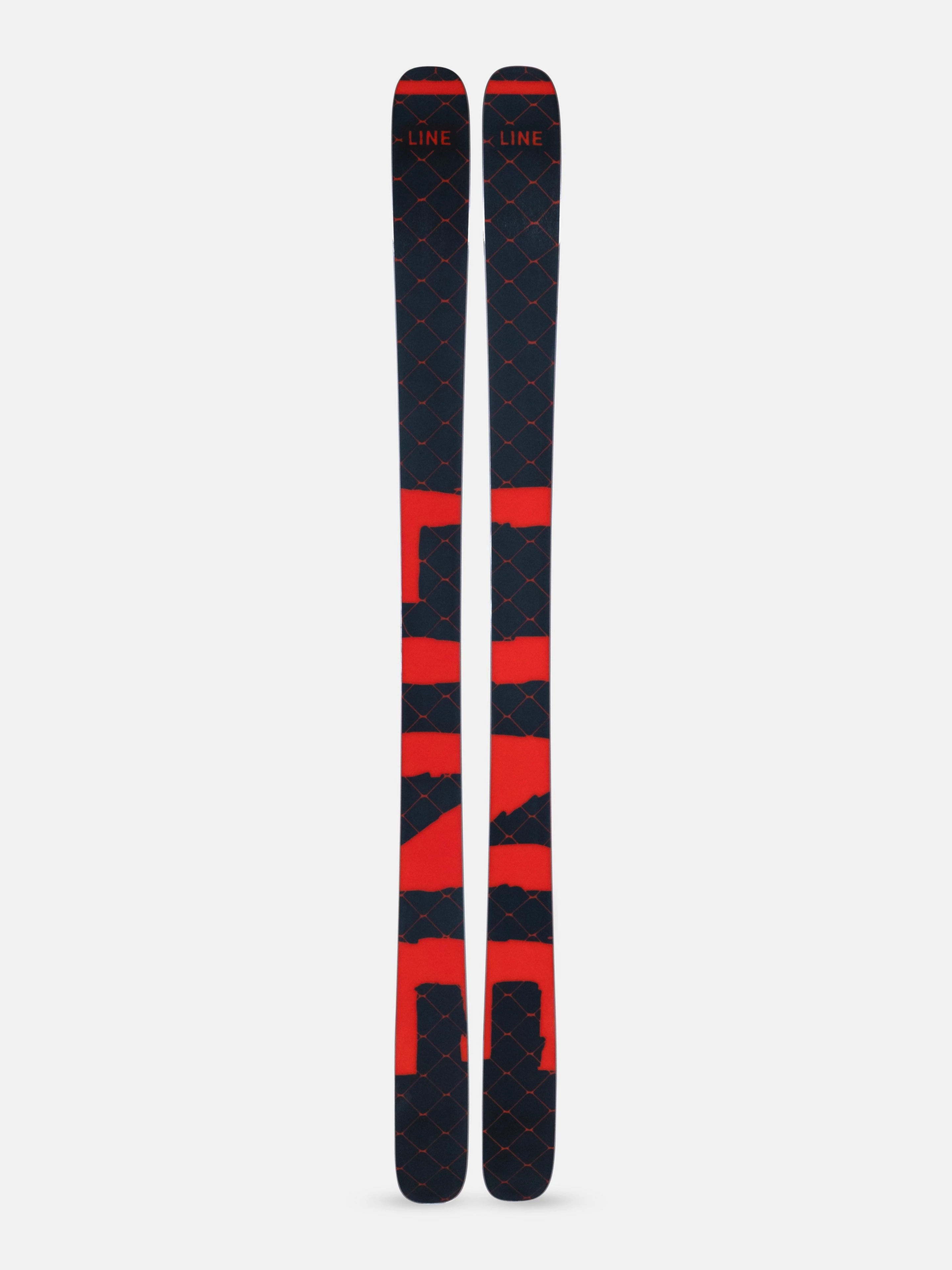 Pair of red and black skis on a white background