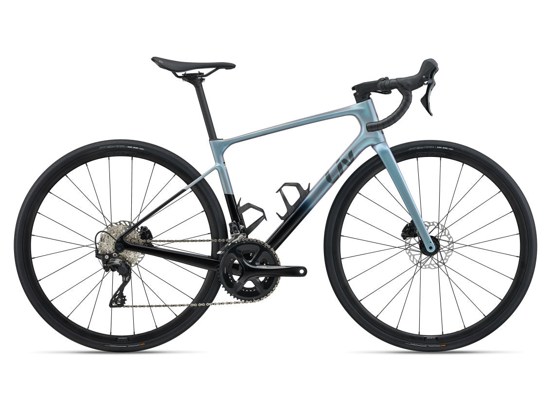Light blue and black bicycle on a white background