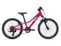 Pink children's bicycle on a white background