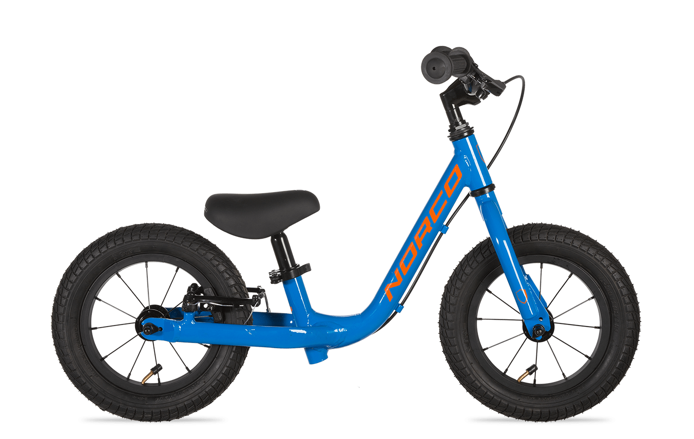 Blue balance bike with black seat on a white background